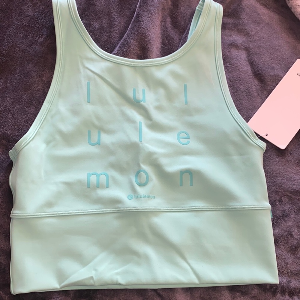 NWT POWER PIVIOT EVERLUX TANK MOTIF
